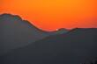 © Luc Bianco - Dernier rayon de soleil couchant et ciel rouge orangé