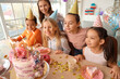 © Pixel-Shot - Cute little children with Birthday cake on table at party