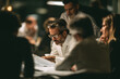 © Thisisbest - Business professionals engaged in strategic planning during a meeting at an office in Paris, France