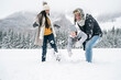 © Westend61 - Happy family in winter landscape