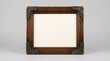 © Ajronujen - Wooden picture frame with ornate corners on neutral background