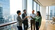 © Momment - Diverse business team toasting with coffee in a high-rise office building