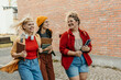 © La Famiglia - Diverse students walking, laughing, and enjoying campus life