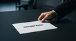 © Hammad - Disciplinary hearing notice on office desk, businessman hand holding official corporate warning letter, human resources termination concept
