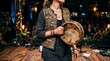 © naevermillion - Musician playing a traditional tambourine at an indoor musical performance.