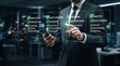 © SahadotPro - A professional businessman interacting with a futuristic digital interface showing complex data analytics and financial information in a modern dark office