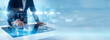 © Sashini - Network engineer touch screen monitoring 5G Technology speed, smart connectivity systems, mobile data transmission and wireless infrastructure innovation. Digital communication and future network.