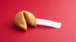 © DrexDesign - Traditional fortune cookie with blank paper slip on red background, golden brown crispy cookie, conceptual image for luck and future predictions