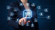 © Graphics - Businesswoman pointing at glowing data security virtual interface with cybersecurity icons, symbolizing digital protection and privacy network