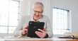 © peopleimages.com - Tablet, research and businessman in office with feedback on property listing, sale or mortgage deal. Digital technology, update and mature real estate agent with email for review on lease agreement.