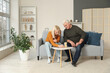 © Pixel-Shot - Mature couple playing game at home