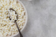© Adria - Rustic cottage cheese in a plate on the table
