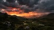 © Zain - Dramatic sunset over a mountainous valley landscape with rain clouds, mountain