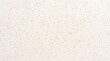 © fadiyah - Close-up of a versatile, light-colored surface featuring delicate, scattered specks, offering a serene and natural aesthetic perfect for sophisticated backgrounds and design overlays