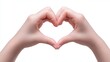 © nattapon - Two hands creating a heart shape symbolize love and connection, ideal for romantic themes, social media posts, and wellness campaigns, These visuals evoke emotions and unity,