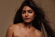 © oneinchpunch - Professional beauty studio portrait on a young indian woman with long dark hair