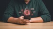 © Studio Infinity - Cybersecurity threat on phone displaying a digital glowing red padlock icon representing a locked or compromised account with cybersecurity security protection unauthorized vulnerability firewall