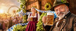 © Sergei - Smiling older Bavarian man and woman in dirndl holding beer steins at outdoor Oktoberfest fairground. German couple celebrating festival with hops garland, checkered ribbon and ferris wheel