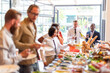 © Rawpixel.com - Casual business lunch gathering photo