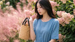© CoreSelect - 벚꽃 아래 가방 든 여성 / Woman with a Bag Under Cherry Blossoms