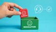 © Bhuiyan - Hand placing complaint block into resolution box with customer service support icons showing problem solving process