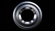© Kurniawan - Shiny metallic circular ring on black background.