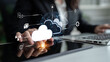© InfiniteFlow - Business professional engaged in cloud technology with digital icons representing data transfer, security, and connectivity. Bitwise.