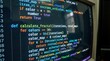 © Praphapan - Close-up shot of a computer monitor displaying colorful code. The code appears to be a program for calculating a fractal, with functions and loops clearly visible.