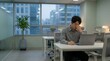 © Sarah - Tired Businessman Rubbing Eyes While Working Late In Modern Office