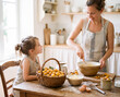 © AlcelVision - petite fille regardant  sa mère en train de faire de la pâtisserie
