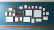 © SirArbusto - Gallery Wall Display: An eclectic arrangement of framed art and empty frames adorns a vibrant blue wall, showcasing a dynamic display of creativity and design.