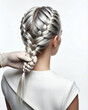 © Yosich1961 - Woman with elegant braided hairstyle in modern salon setting
