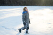 © Volodymyr - Cute child for Christmas card. Child running in snow. Merry Christmas child photo. Winter fun kid. Child winter outdoor portrait. Xmas snowy portrait.