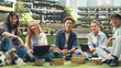 © DC Studio - Portrait of classmates studying together on a campus lawn, reading notes from laptops and books in an academic environment that supports collaborative outdoor learning with international peers.