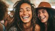 © arthit - Joyful moment of two friends smiling and laughing together at a lively summer festival in a vibrant outdoor setting