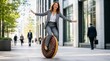 © wirbron - Joyful businesswoman balancing on a giant donut unicycle in a modern city