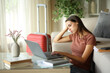 © PheelingsMedia - Bored teleworker working during business travel