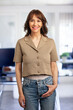 © sepy - A middle-aged business standing at the office and looking at camera