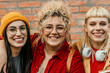 © La Famiglia - Diverse young women friends smiling together for portrait