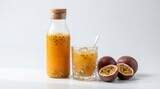 Fresh passion fruit juice drink and whole fruits on white background