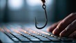 © Ірина Пальцева - A fish hook suspended above a keyboard with a hand nearby, illustrating concepts of digital threat, security risk, fraud, and online vulnerability in a technology-driven world