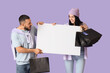 © Pixel-Shot - Young couple with shopping bags and blank poster on lilac background. Cyber Monday