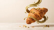 © Art_spiral - Golden buttery croissant floating with swirling green pistachio cream sauce and crushed nuts for bakery menu dessert advertising food concept studio shot