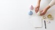 © Thumbs - Hands preparing party favors with festive cone hats and star confetti