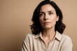 © Vadym - Woman looks thoughtful side. She ponders deep thoughts, maybe facing tough decision. Her expression hints worry and contemplation on her face.