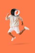 © Pixel-Shot - Man with a sushi roll head jumping and flexing his arm, healthy eating and active lifestyle concept, isolated on an orange background