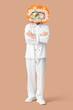 © Pixel-Shot - Chef in white uniform with a california roll for a head culinary creativity and the art of japanese cuisine