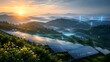 © Vanxay  YIAKAOVANG - Solar panel farm on green mountain slope connected with digital network power grid lines at sunrise, smart renewable energy concept.