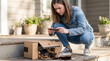 © IllustrationAlchemy - Woman photographing broken package and spilled jar on porch.