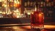 © MBRAMO - Elegant Whiskey Bottle on Bar Top with Blurred Background.